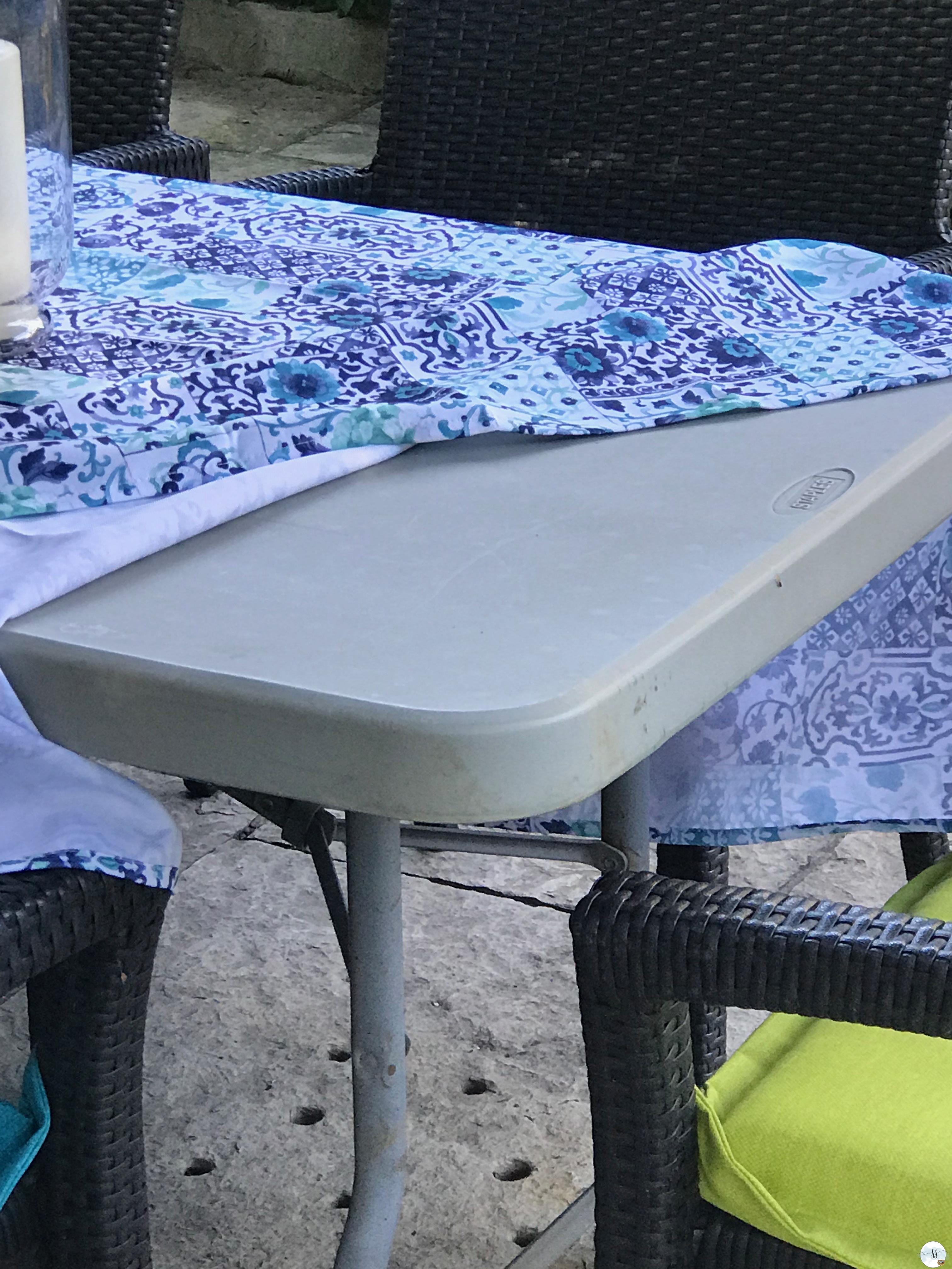 Folding table as an outdoor dining table works in a pinch.