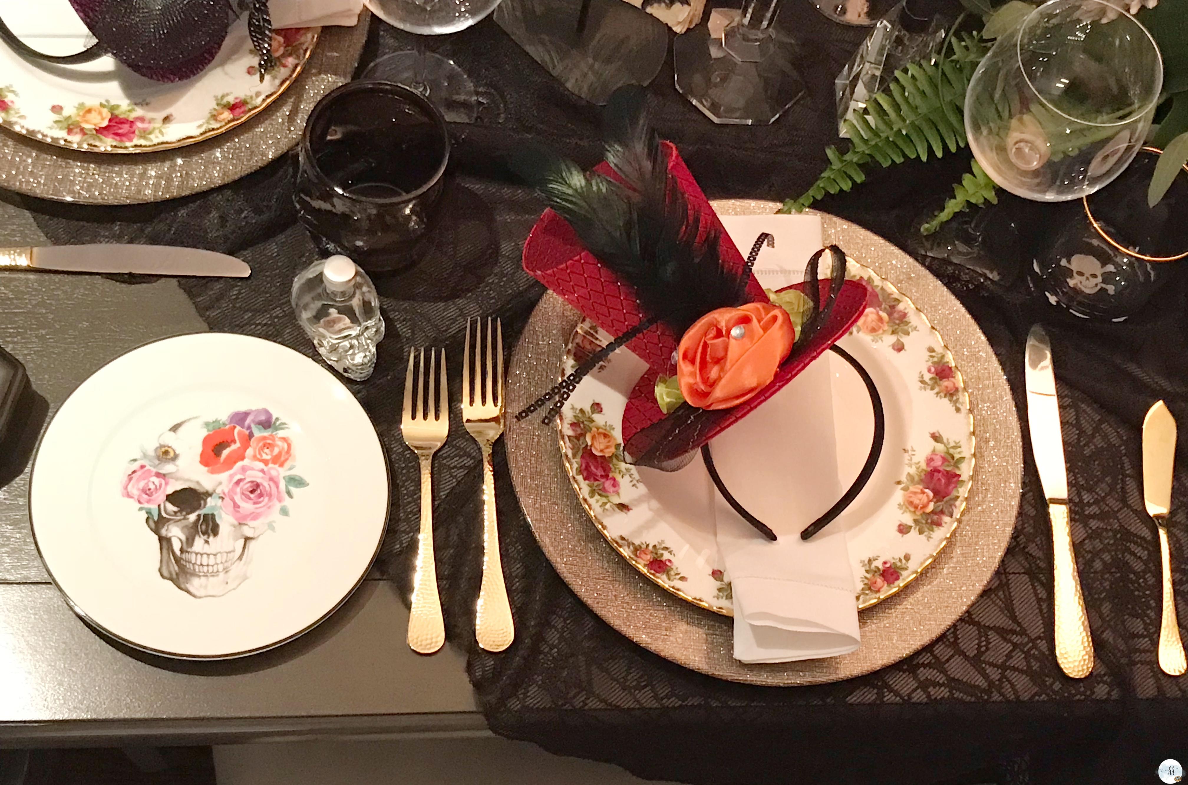 Gothic table scape for Halloween this year. Love the skulls on the plates