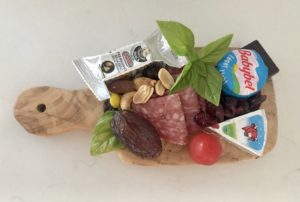 Charcuterie board for one staying safe while social distancing. Great idea for entertaining use single serve charcuterie boards. 